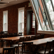 Best corporate event venue in Boulder, the Riverside Agora room set for a company event beside Boulder Creek