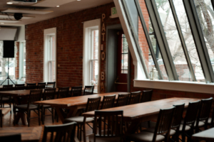 Best corporate event venue in Boulder, the Riverside Agora room set for a company event beside Boulder Creek
