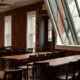 Best corporate event venue in Boulder, the Riverside Agora room set for a company event beside Boulder Creek
